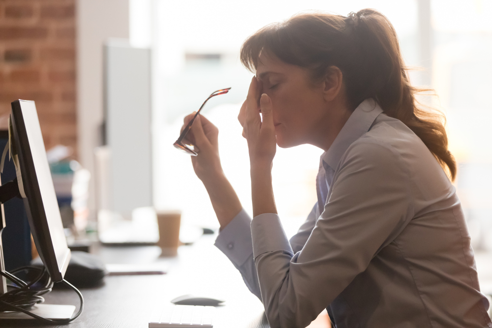 woman with intense headache pain